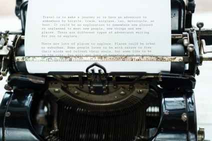 paper attached to typewriter